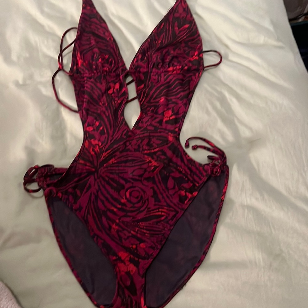 Victoria’s Secret mesh one piece bathing suit.